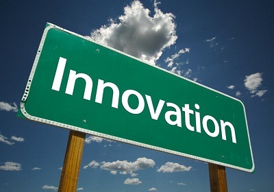 A green road sign with Innovation printed on it